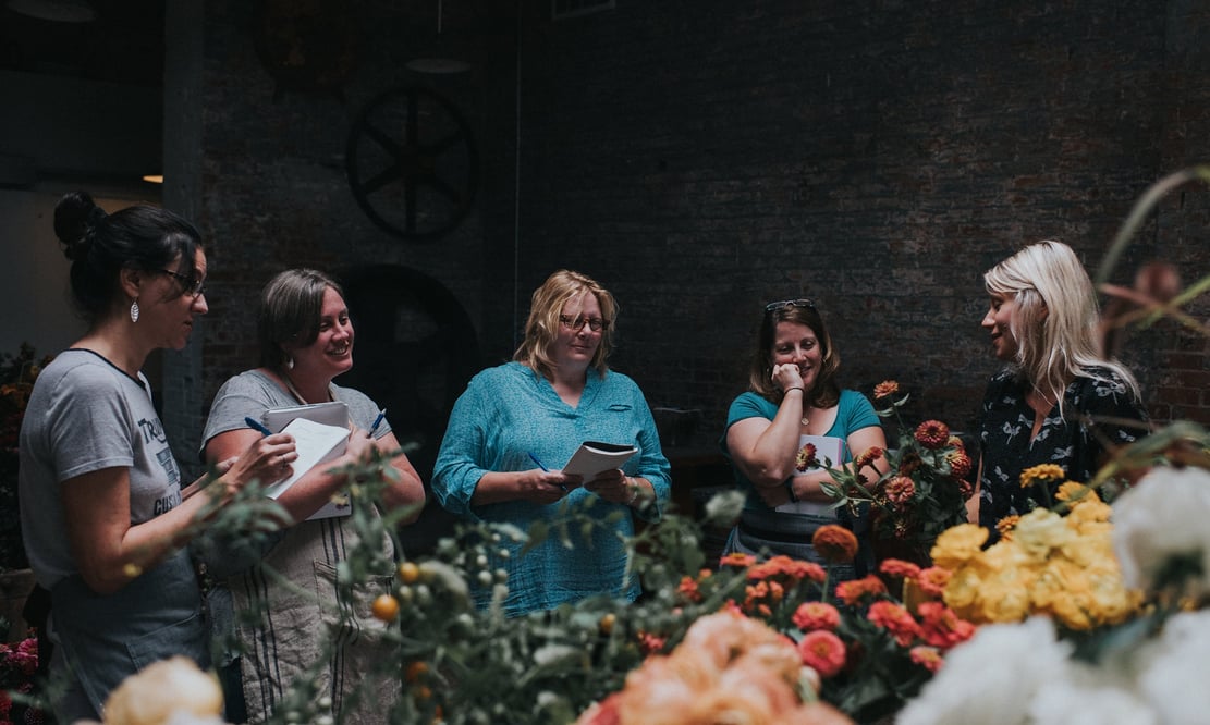 Semia Dunne teaching a class in the Flowers by Semia studio