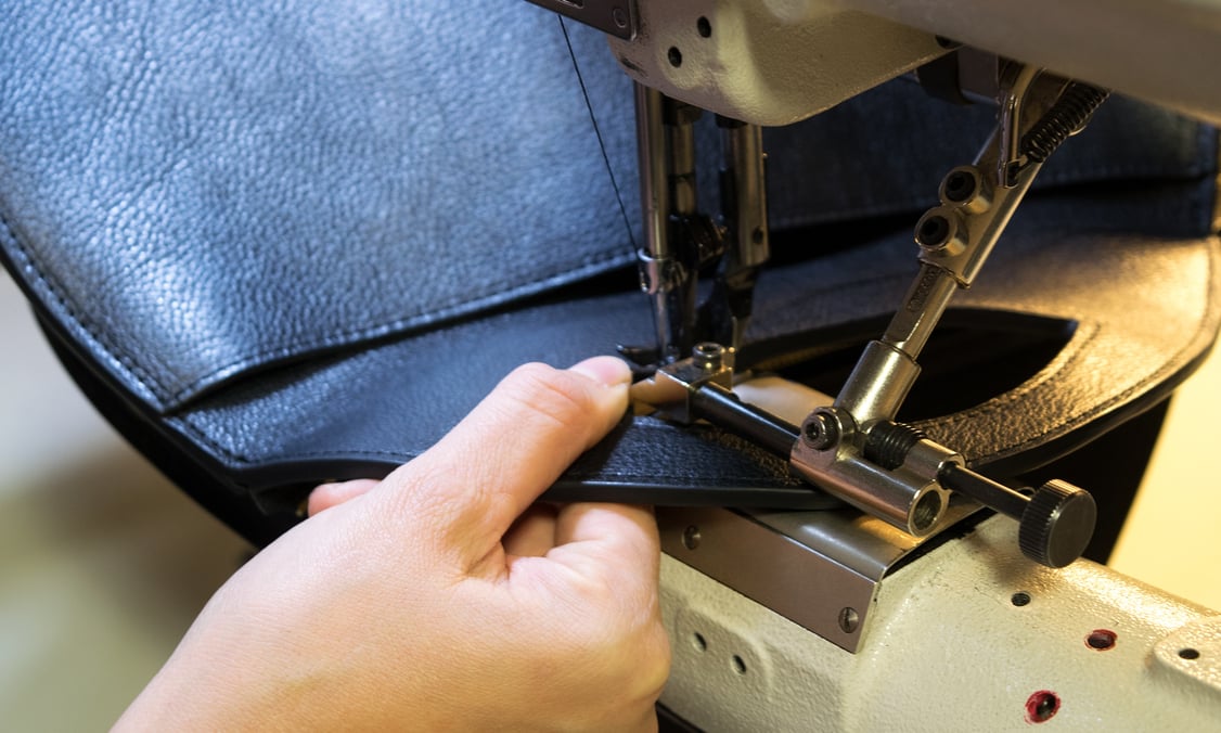 Stitching the Lotuff Leather Rho handbag in black
