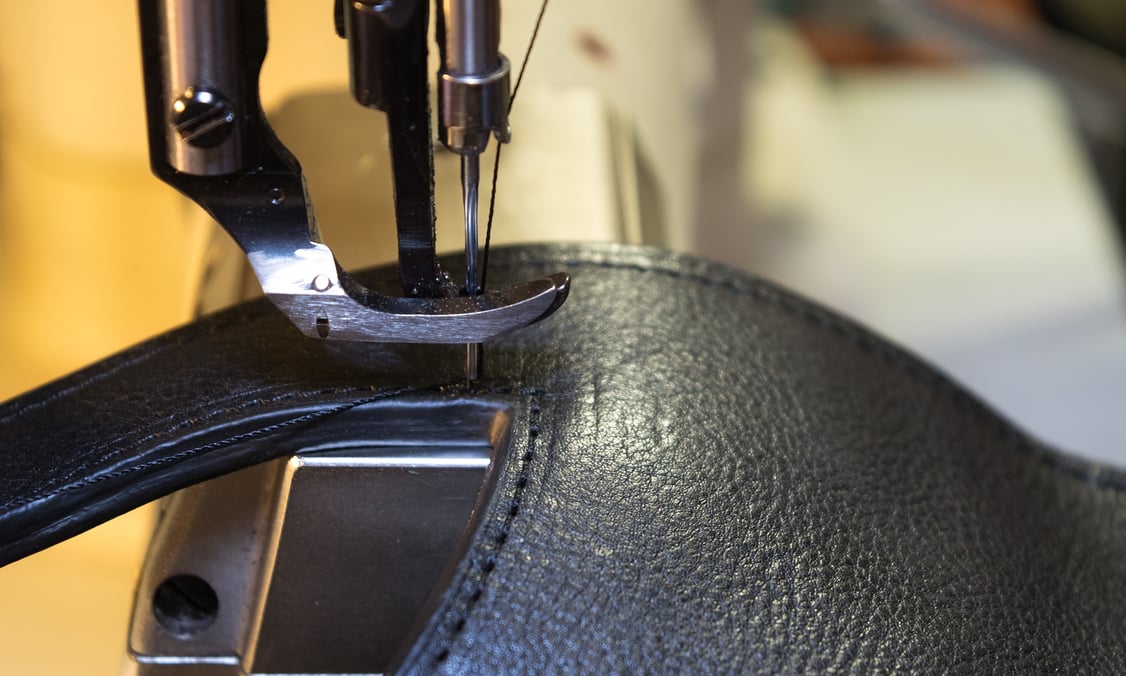 Stitching the Lotuff Leather Rho handbag in black