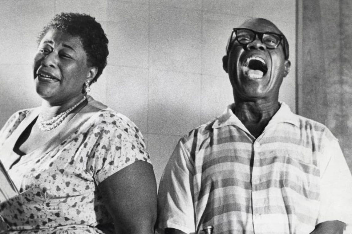 Ella Fitzgerald and Louis Armstrong singing