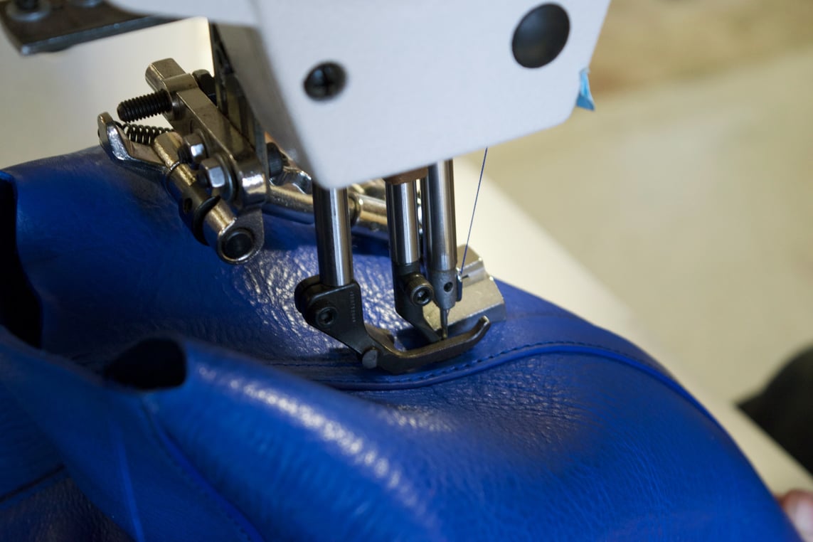 Stitching the Lotuff Leather No. 12 Tote in electric blue