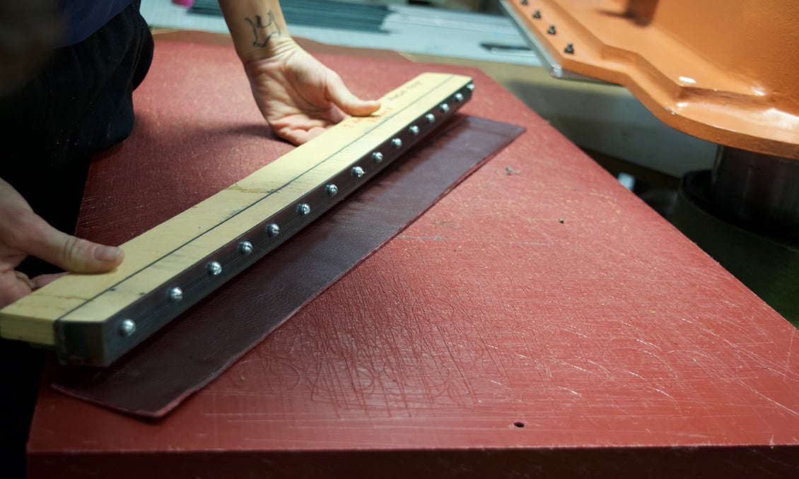 Cutting straps for Lotuff's leather Angle Tote
