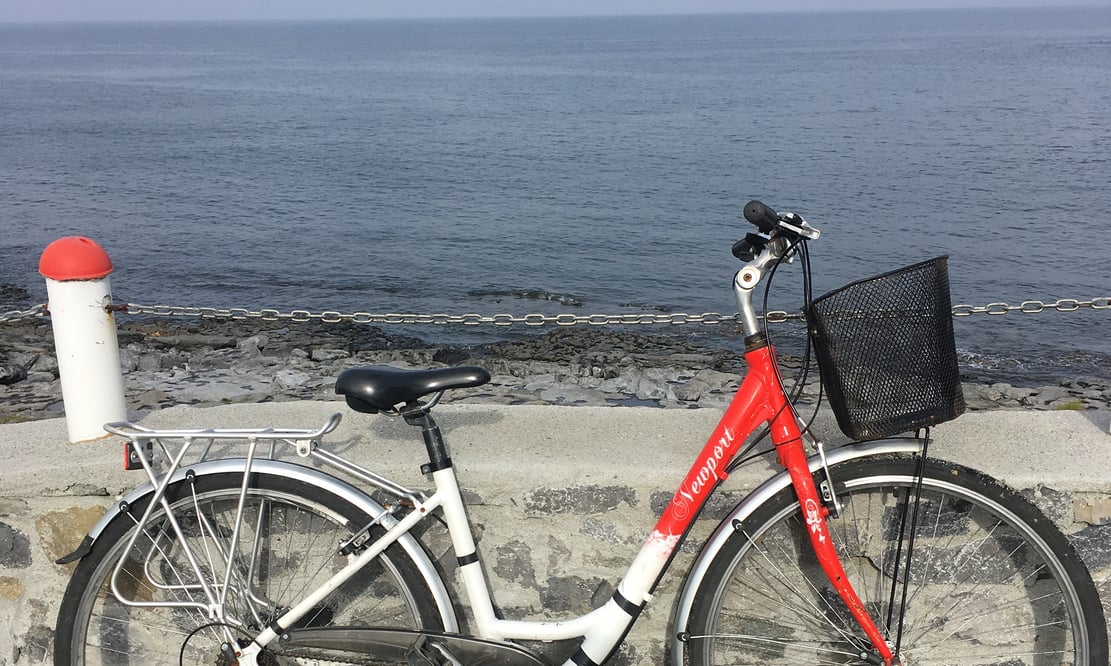 Biking by the sea on the Aran Islands of Ireland