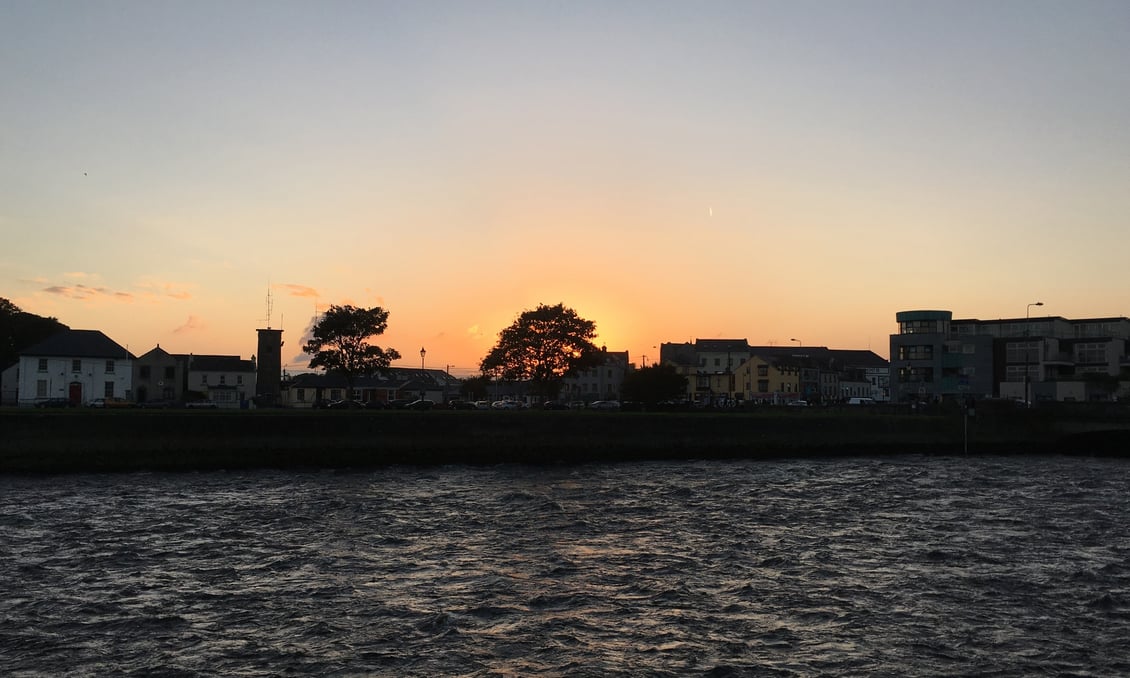 Sunset over the water in Galway, Ireland