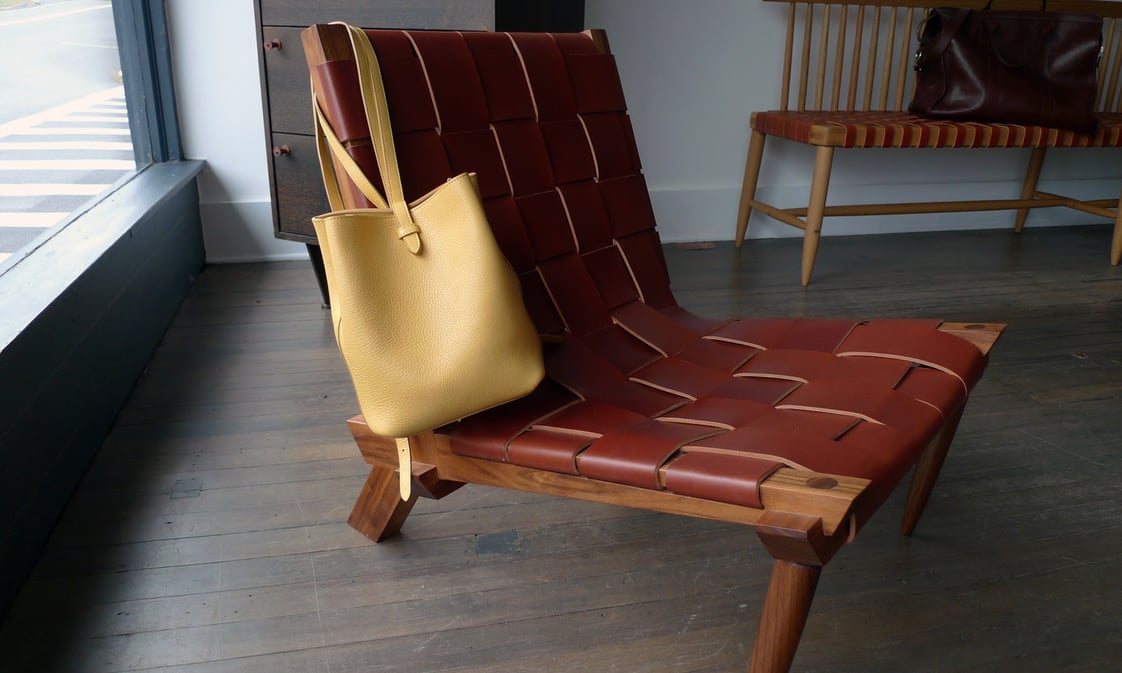 Lotuff Leather Mini Sling in ochre x Michael Robbins chair