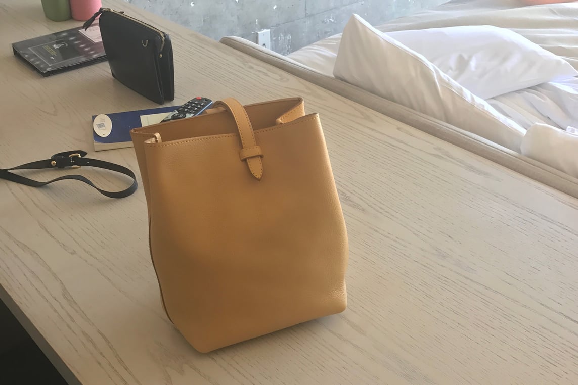 Lotuff Leather Mini Sling backpack in ochre in Los Angeles, California