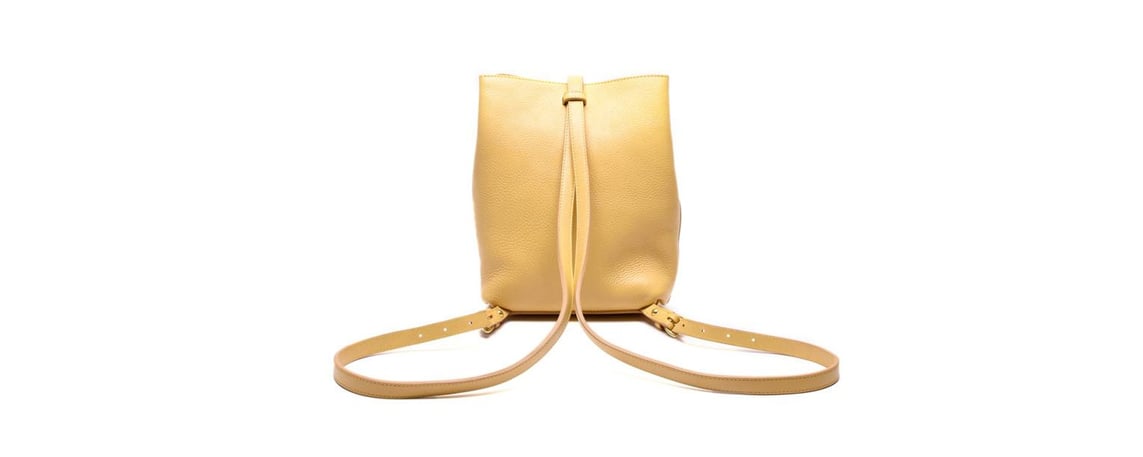Lotuff Leather Mini Sling backpack in ochre