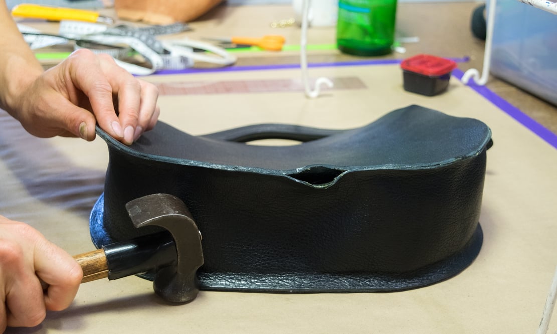 Assembling the Lotuff Leather Rho handbag in black