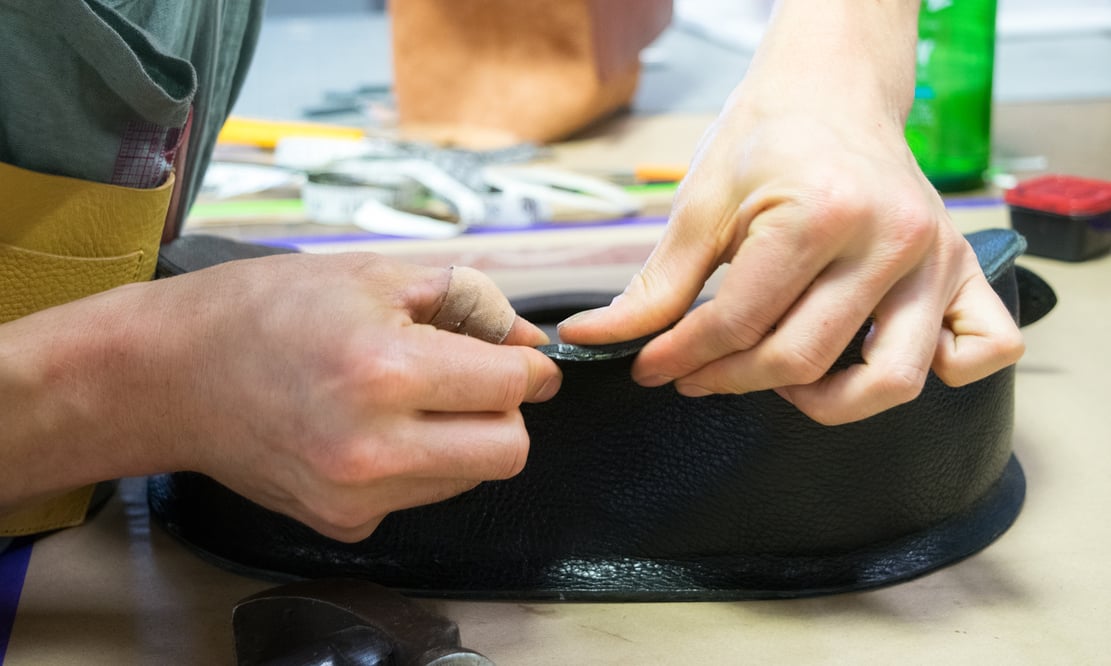 Assembling the Lotuff Leather Rho handbag in black