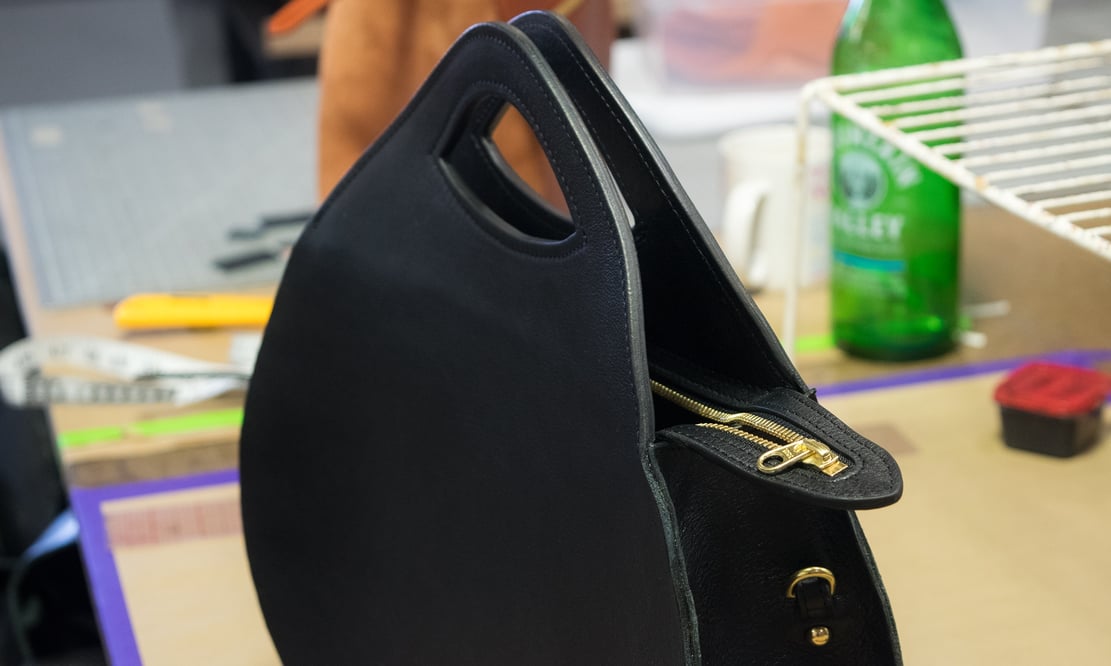 Assembling the Lotuff Leather Rho handbag in black