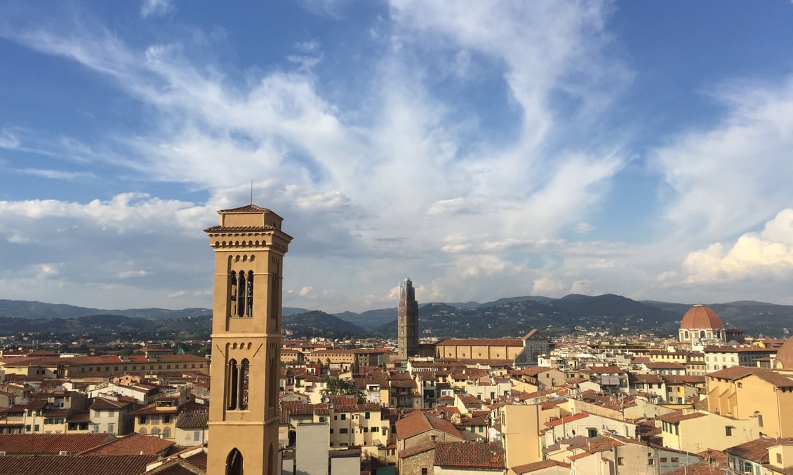 Rooftop panorama in Florence, with the Duomo visible off in the distance